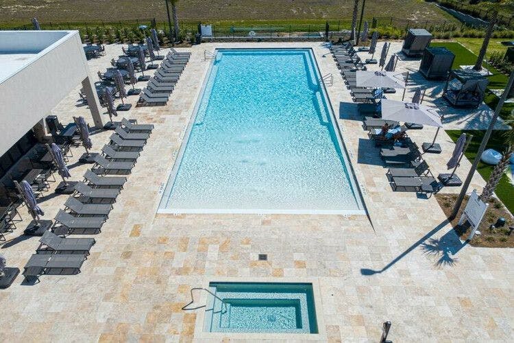 Aerial view of the resort pool and hot tub at Magic Village Views
