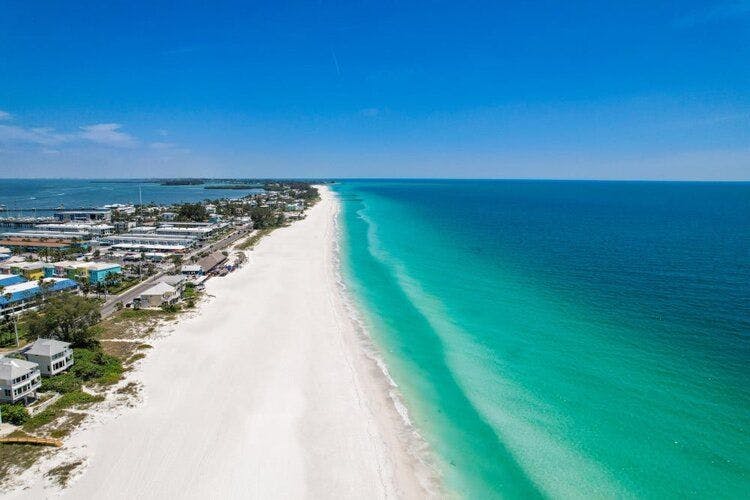 Beautiful white sand stretch of Bradenton Beach in Anna Maria, Gulf coast of Florida