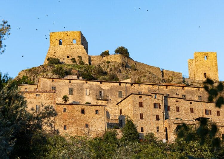 A view of the hilltop Rocca di Montemassi castle in Grosseto