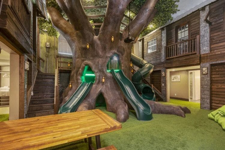 Orlando unique homes like Reunion Resort 1098 with its epic themed game rooms. Indoor treehouse with slides.