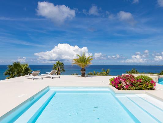 https://www.thetopvillas.com/destinations/caribbean/saint-martin/happy-bay/dreamin-blue/