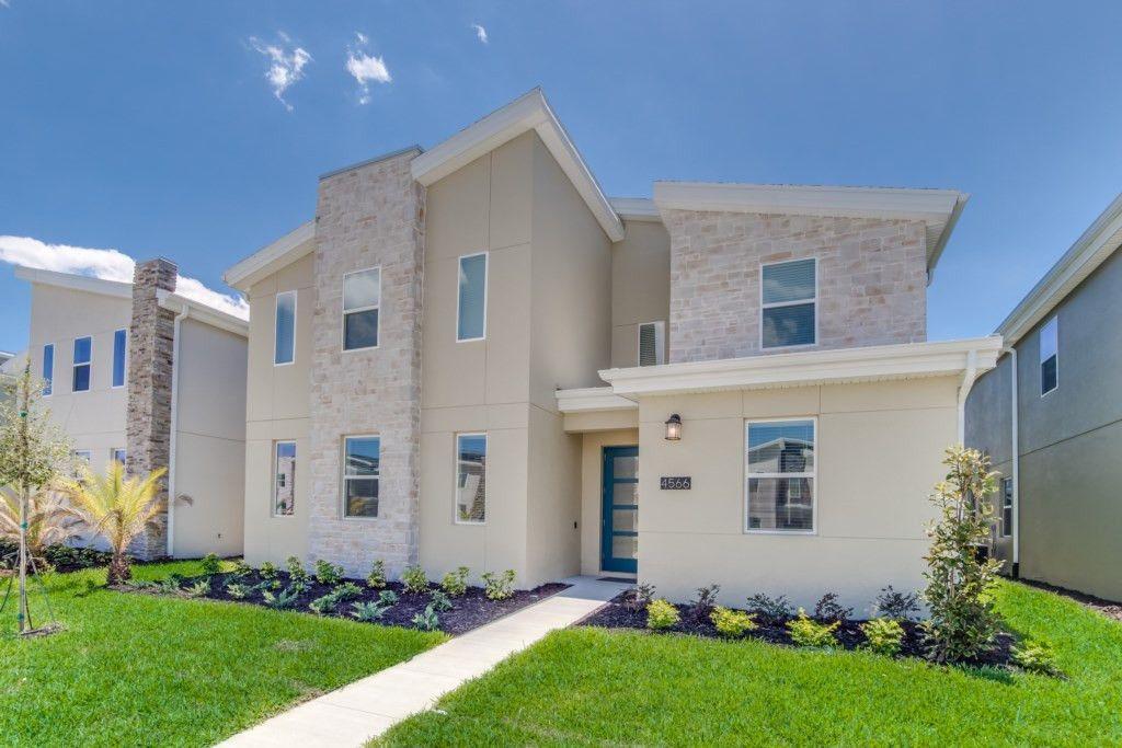 9 bed storey lake resort home facade.jpg