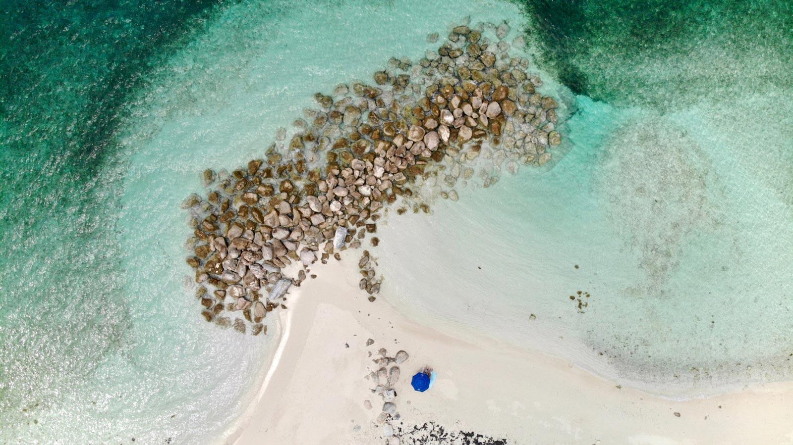 Overhead view of rocky bar at Babalua Beach
