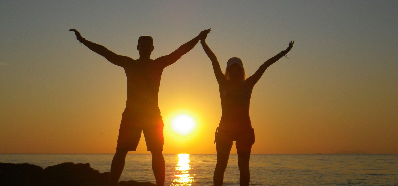 Best beaches in Dubrovnik, couple on the beach at sunset, Top Villas