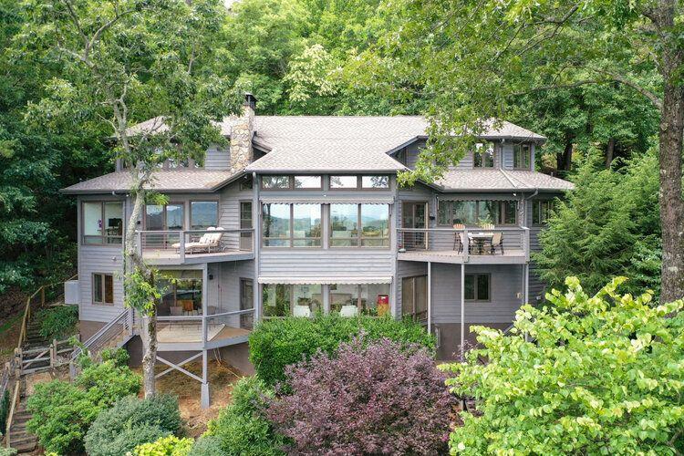 Facade of Big Canoe 1 in the woods