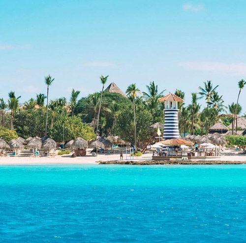Casa de Campo white sand beach with striped lighthouse