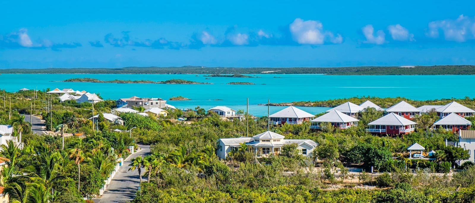 Chalk Sounds village with offshore national park in the background