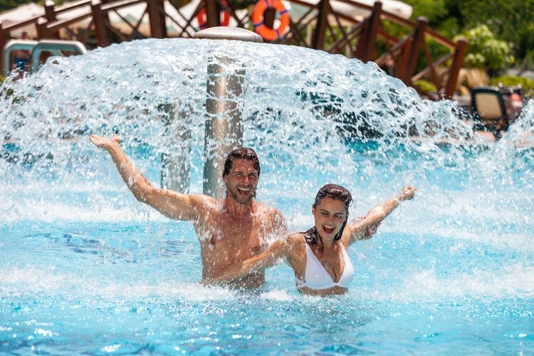 A couple soaking up the waterpark