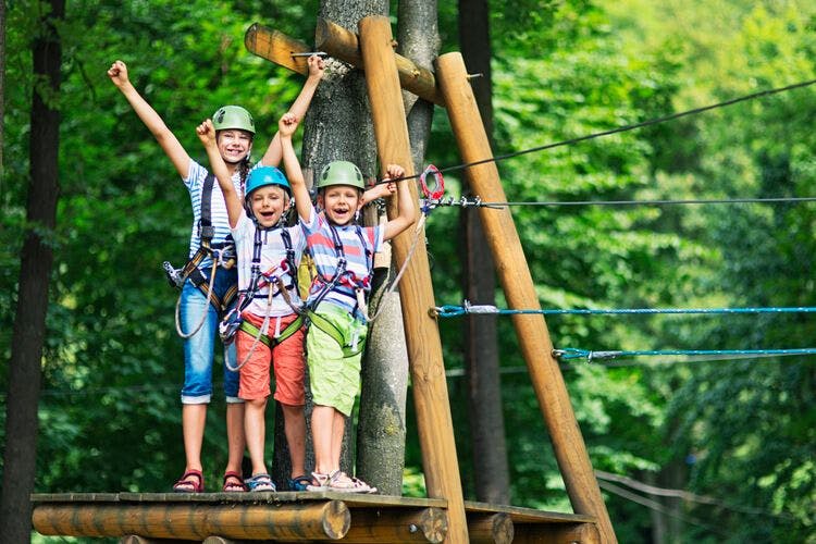 A fun-loving family get ready to go zip-lining