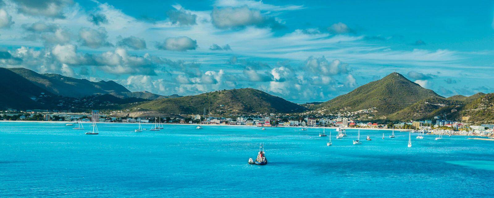 Saint Martin coastline with boats in the harbor