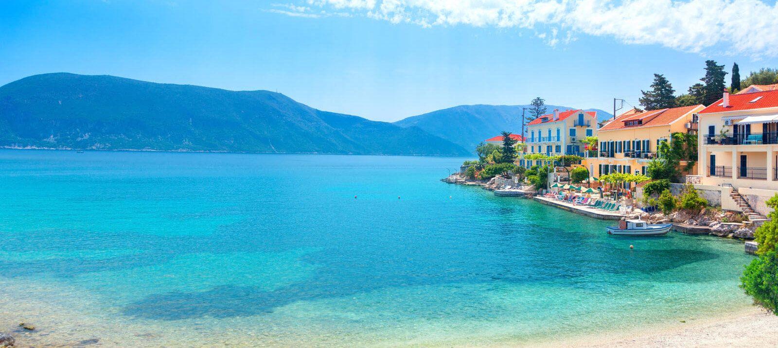 A small Greek fishing village by the water
