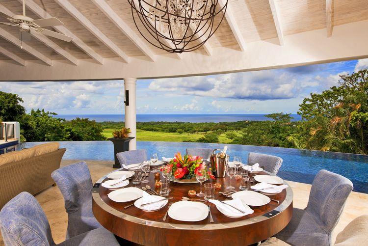 Lancaster vacation rentals with beautiful views - Martello House covered dining area with infinity pool and view of the sea