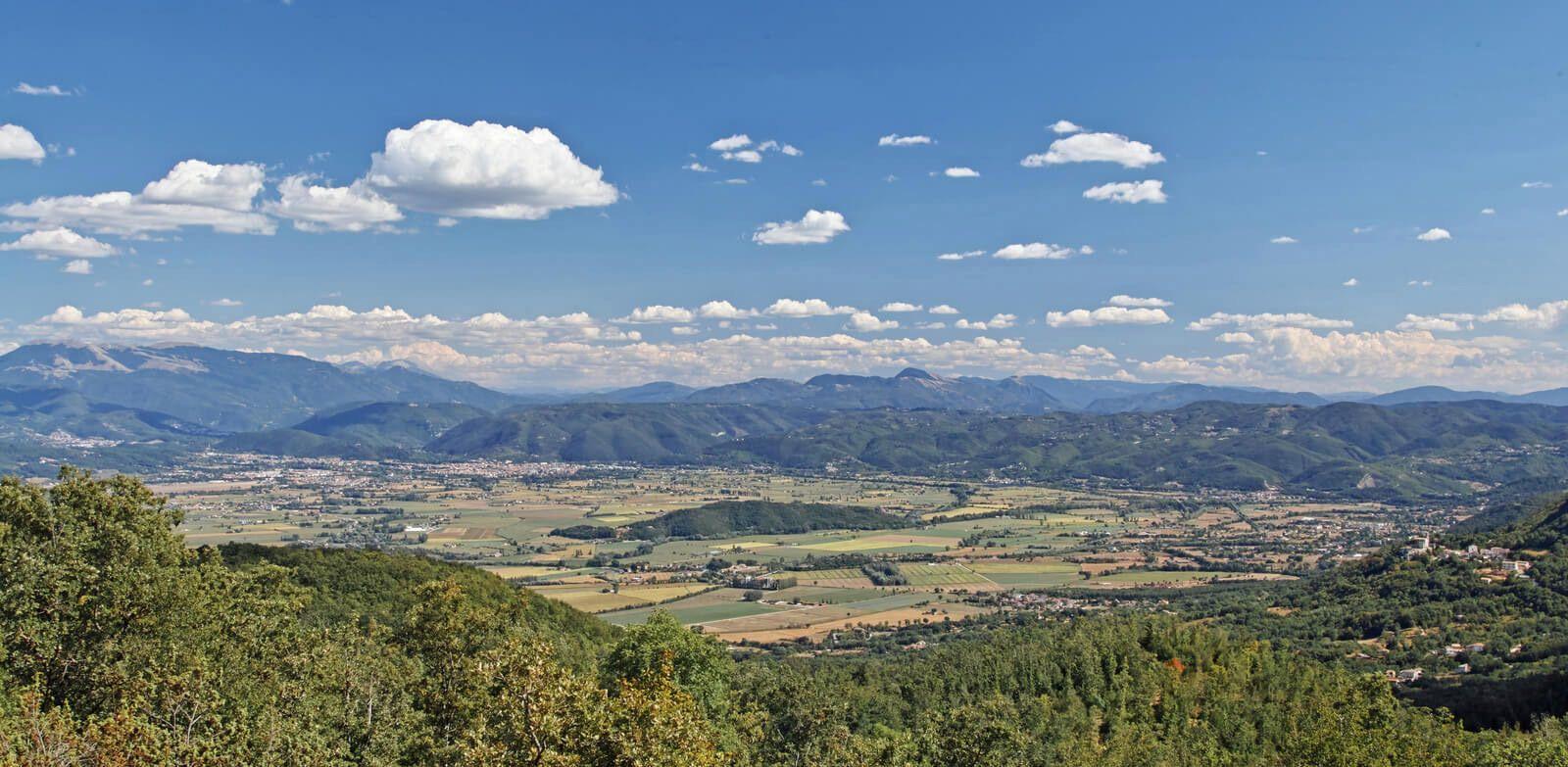 Lazio landscape of green fields and mountains in the distance