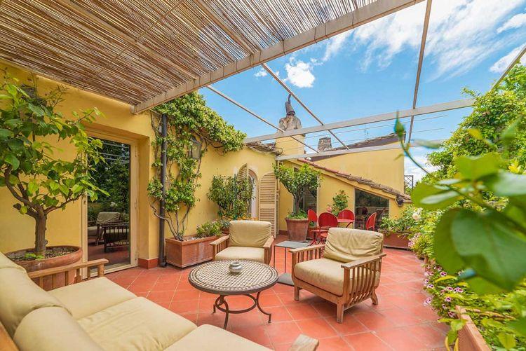 Outside patio with chairs and table