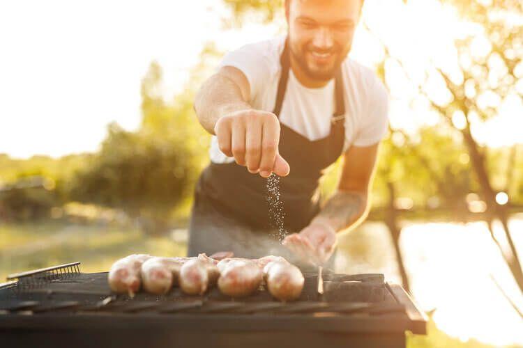 A private chef prepares a BBQ