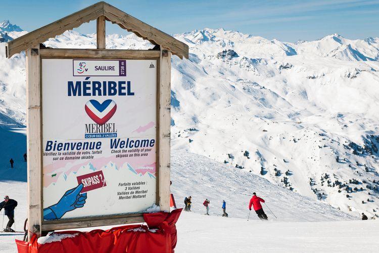 Meribel resort faqs, resort sign on the ski slopes, Top Villas