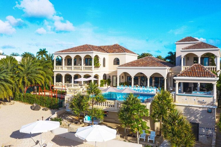 Sandcastle villa Caribbean beachfront villas for huge group vacations