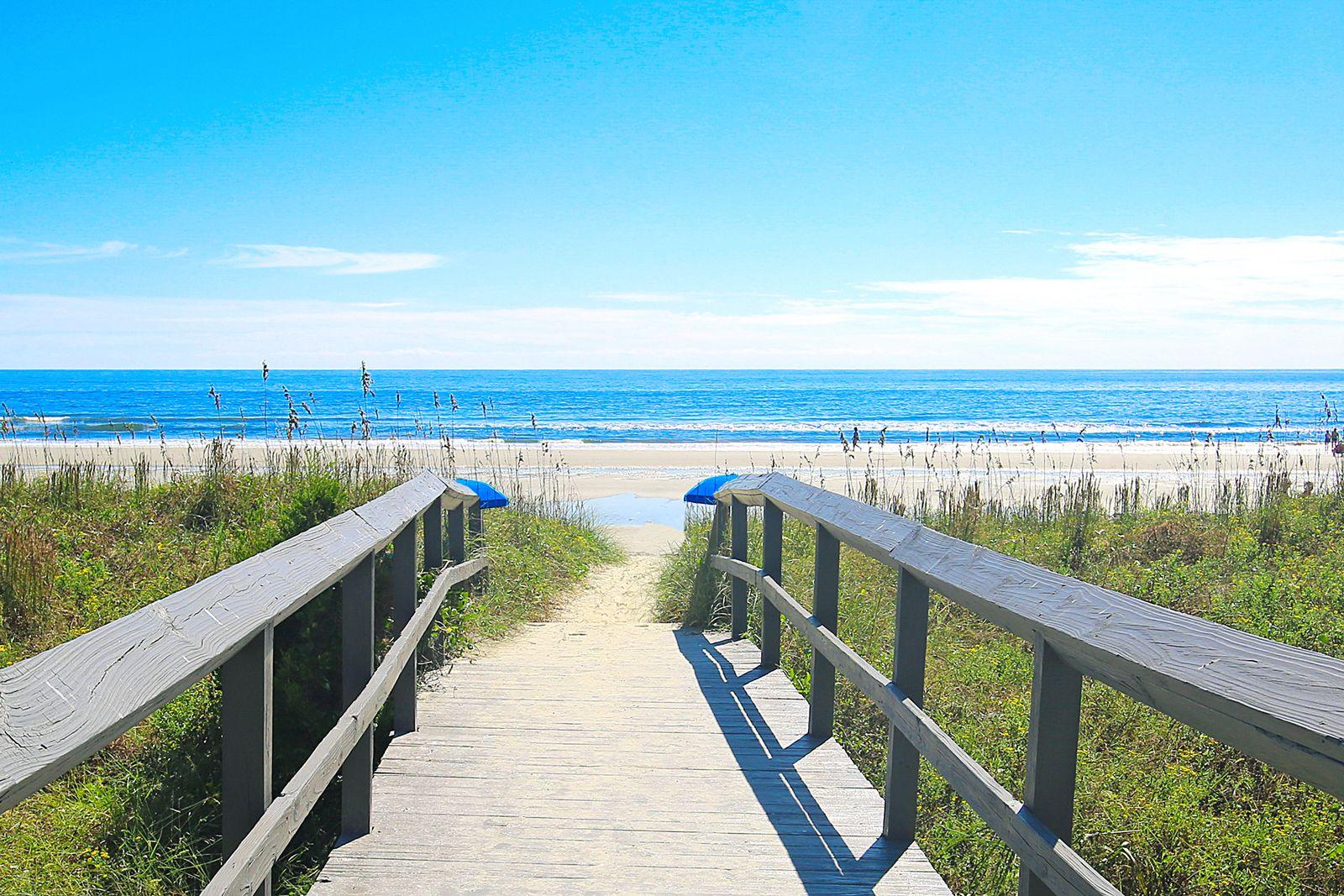 Boardwalk leading the white sand beach in South Carolina