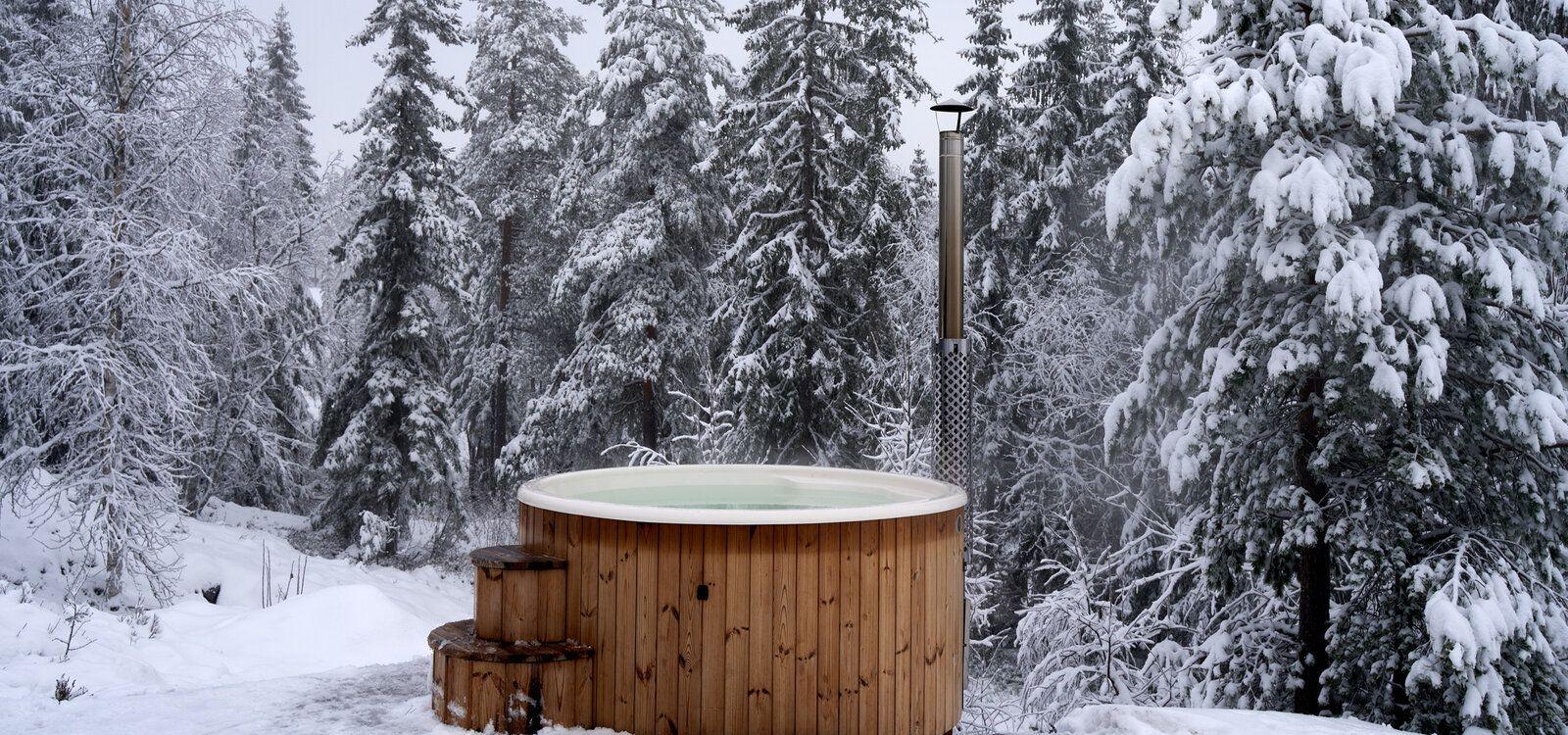 Chalts in Chamonix with hot tub, snowy scene with outdoor hot tub, Top Villas