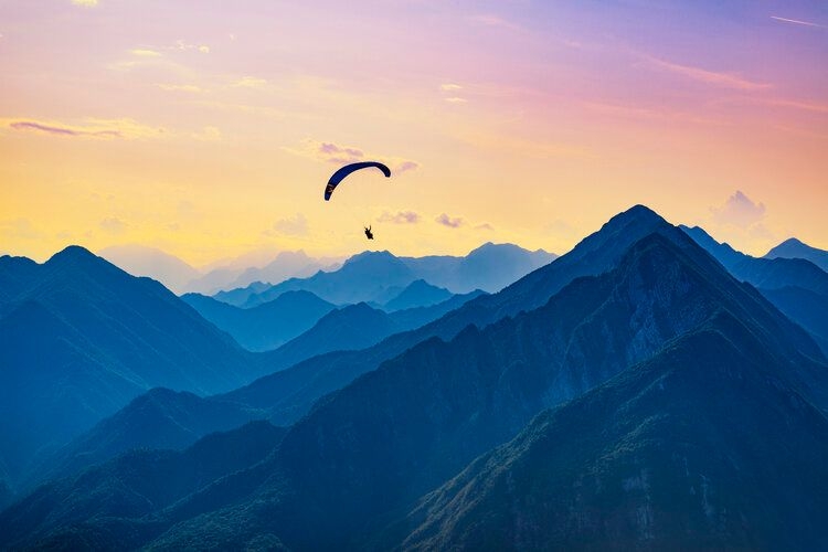 The best time to visit Courchevel, paragliding in summer, Top Villas