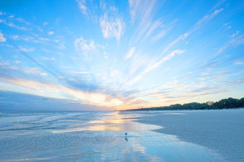 Sunrise over a white sand beach in Sea Islands