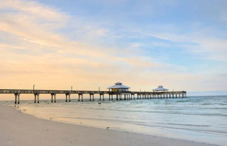 Fort Myers pier on white sand beach