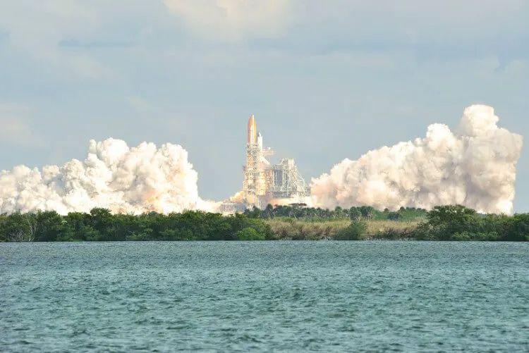 A space shuttle taking off from Kennedy Space Center