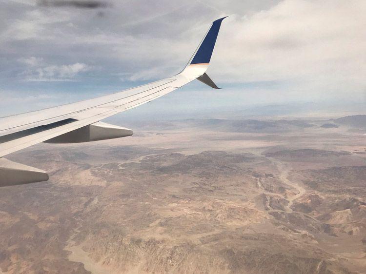 View from the plane wing of desert landscape around Palm Springs