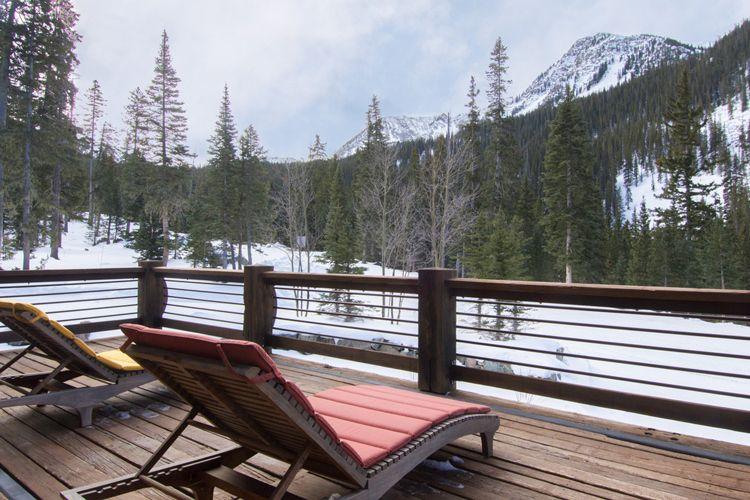 Vacation rentals in the New Mexico mountains - Taos Ski Valley 7 outdoor porch with chairs and mountain views