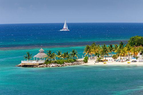 Sailboat on a calm Caribbean Sea off Jamaica