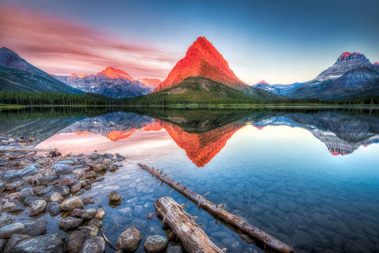 Sunrise over mountain and lake view at Glacier National Park - The best places to visit in June