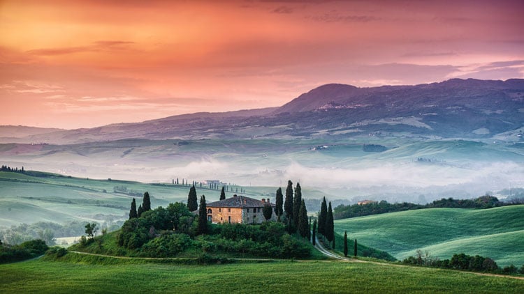 The best places to visit in September- misty morning over Tuscany fields