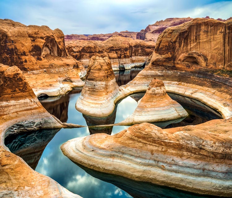 The best places to visit in September - river carving through a rock canyon in Utah